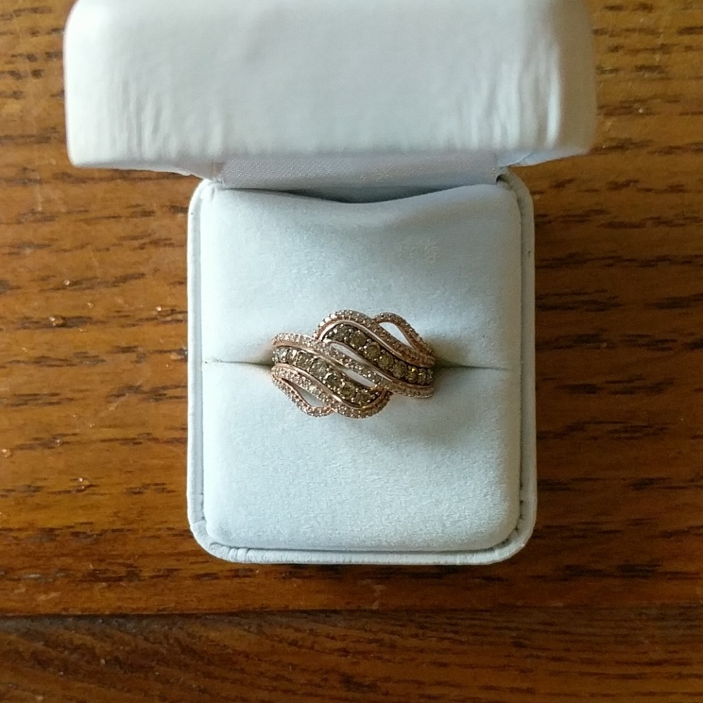 Champagne diamonds in rose gold. Pretty ring $600